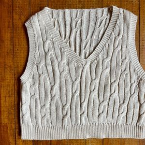 White cable knit vest.